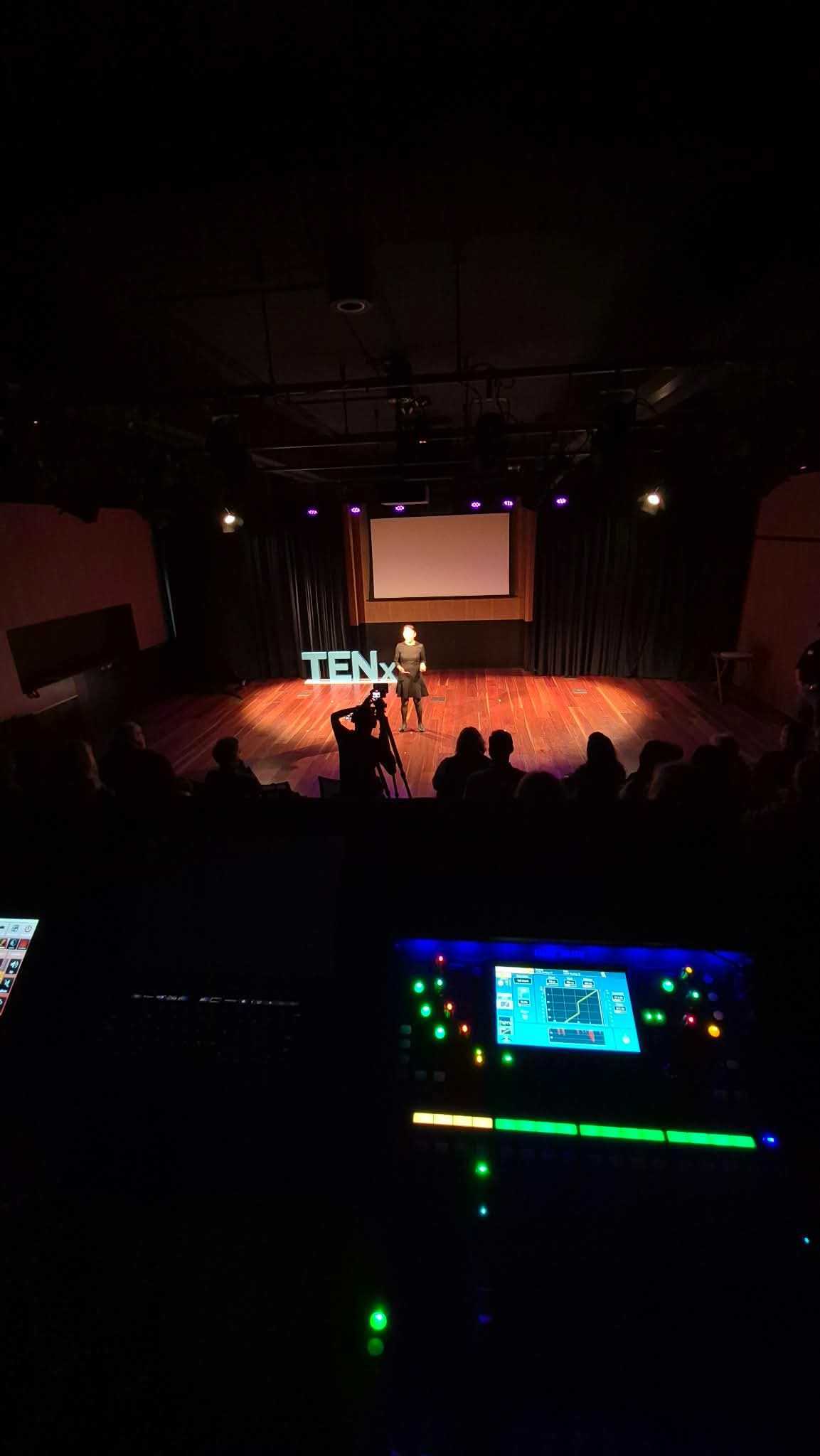 Speaker presenting on the TENx Victoria stage
